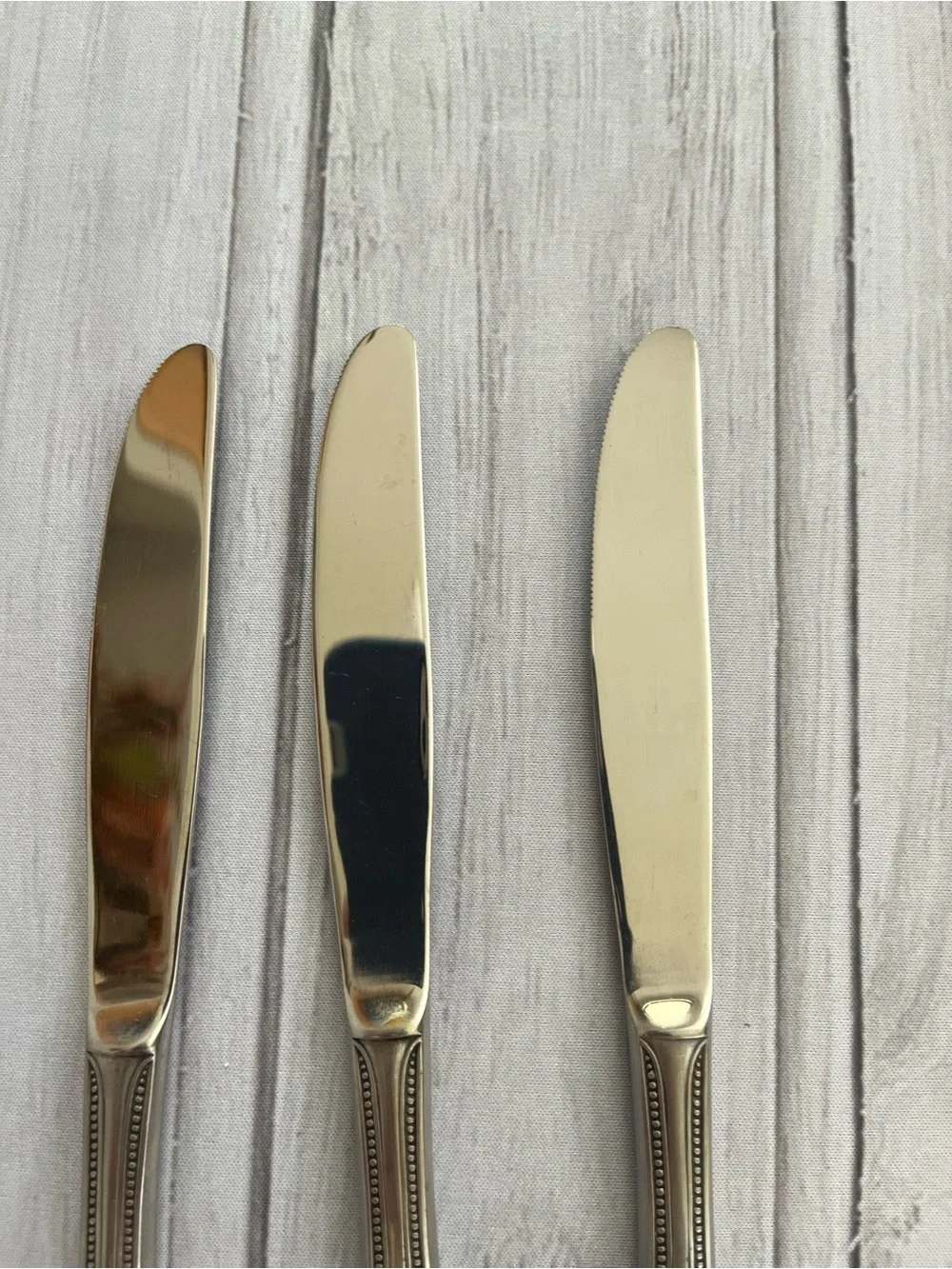 One set of 3 vintage Salem 1776 stainless steel beaded edge butter knives.